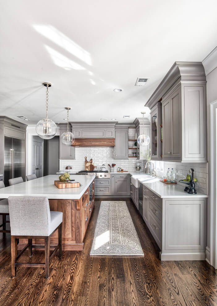Dark wooden floor gray kitchen cabinets