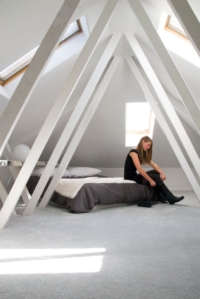 Small modern bedroom with attic