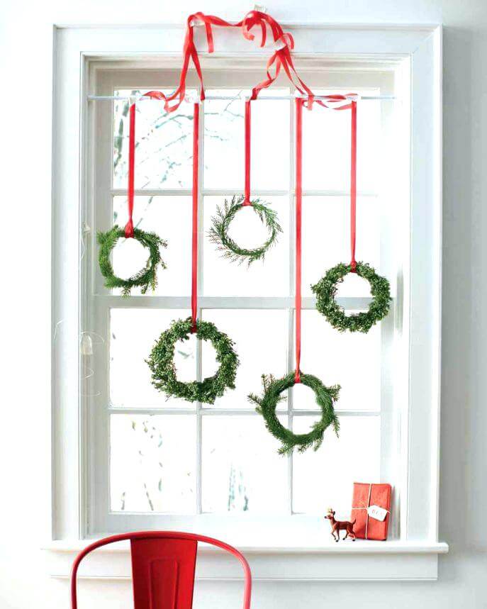 Christmas window decorations with wreaths