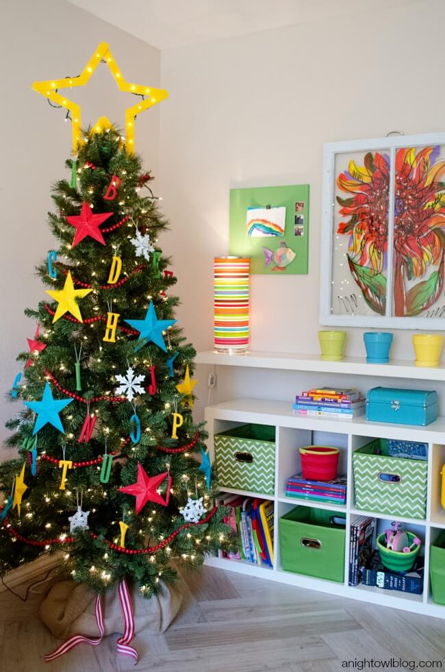 Colorful children play Christmas tree