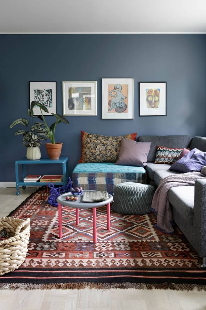 patterned carpet and gray sofa