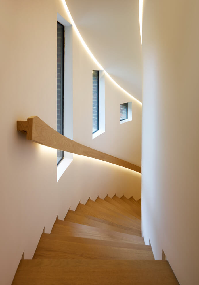 Spiral staircase wall and railing light