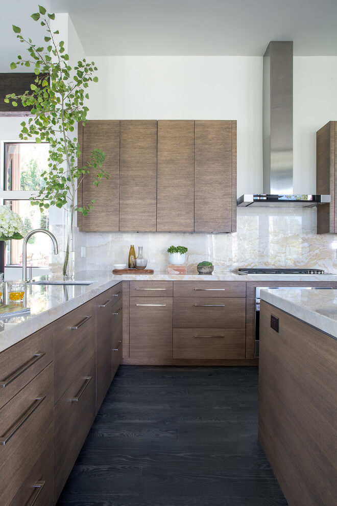 wooden cabinets and marble countertops