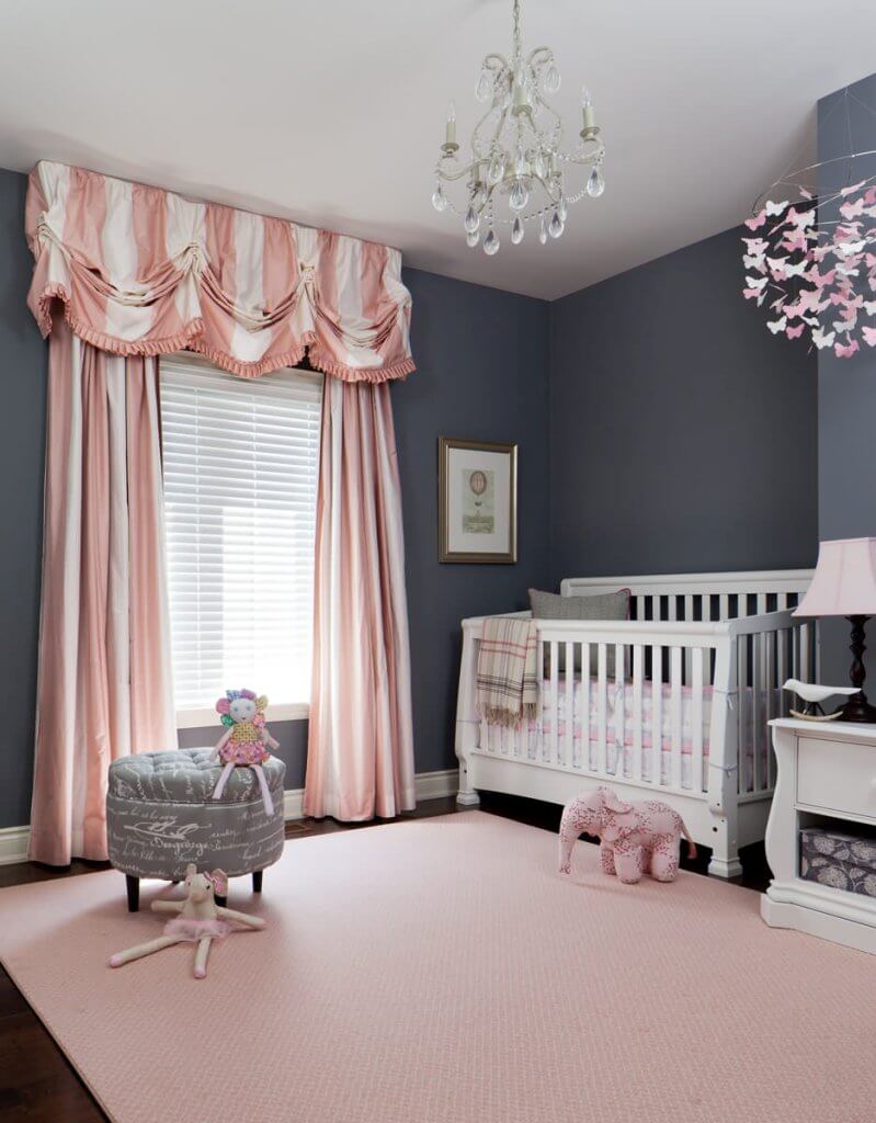 Patterned pink curtains traditional nursery