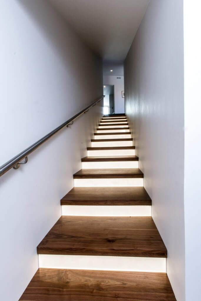 Elegant wooden style LED lighting staircase inside your house