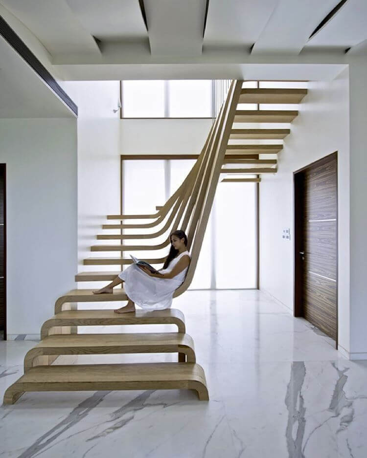 Sculptural wavy wooden staircase design idea