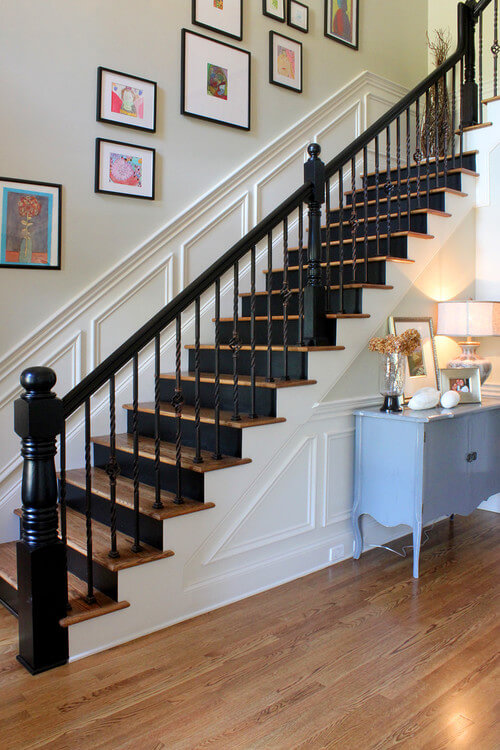 Black and white staircase with wall art decor