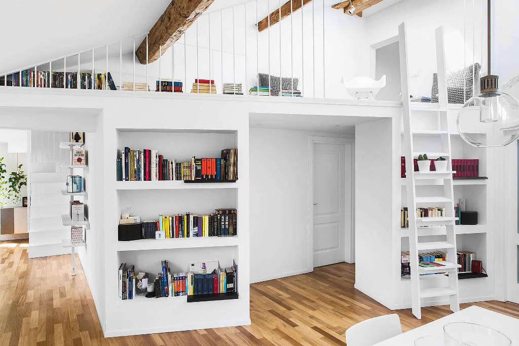 Bookshelves in living room with white interior