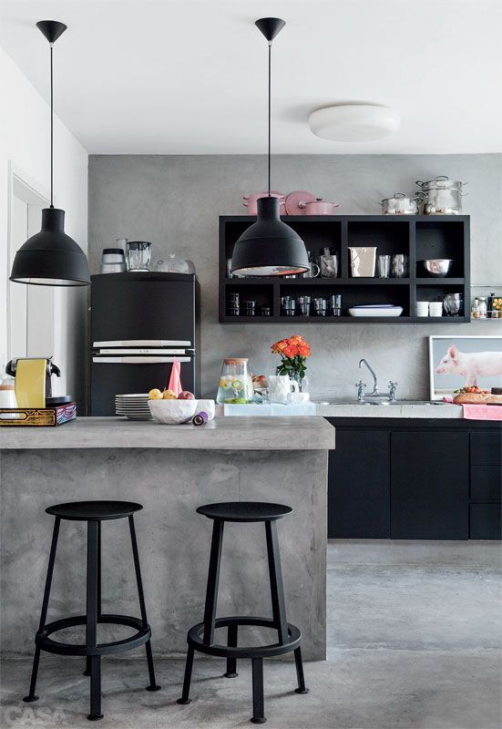 Black and concrete kitchen