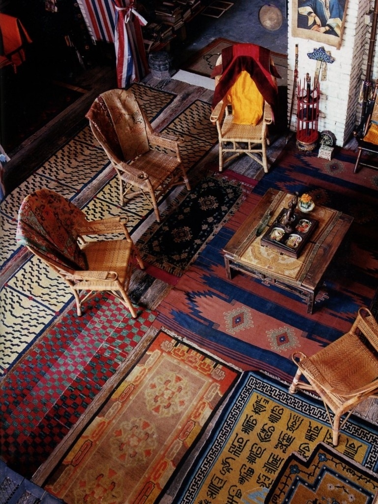 Layered carpet decor in bohemian living room