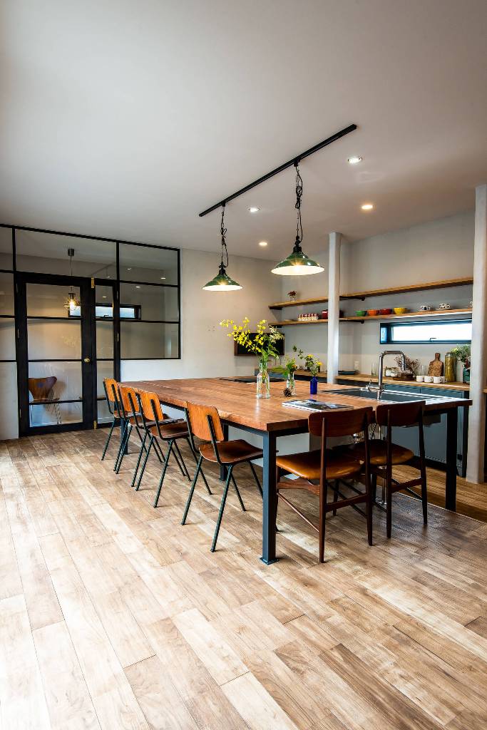 Kitchen with wooden floor and dining room