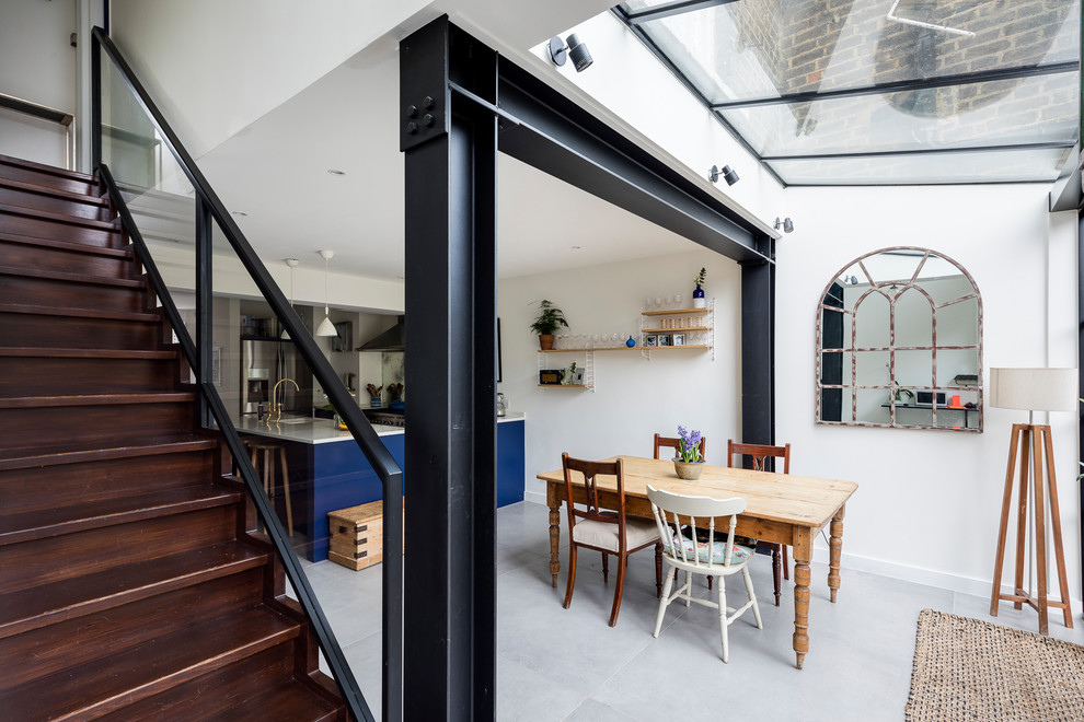 Natural light glass roof in kitchen with stylishly exposed steel beams