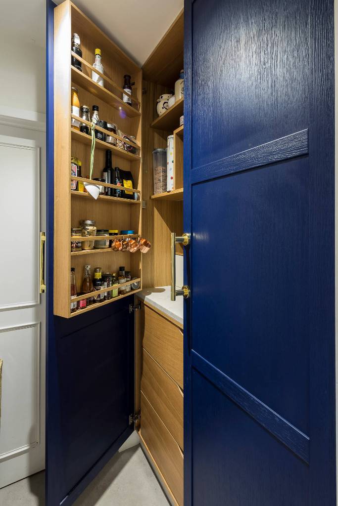 Huge custom-made pantry blue door