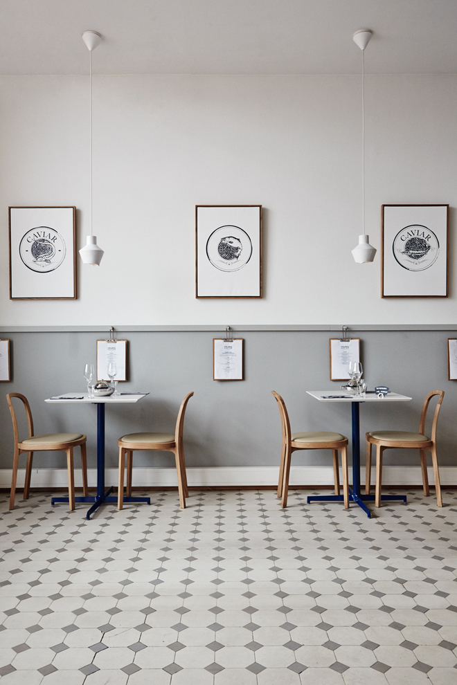 Bright interior with pattern plates on floors in Finlandia Caviar shop and restaurant