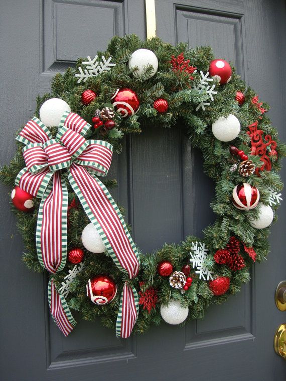 Red and White Christmas Wreath with Ribbon. $60.00, via Etsy .