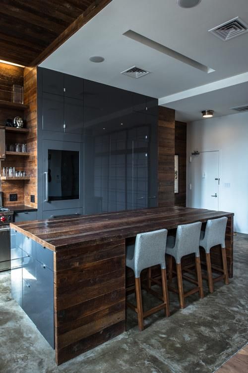 Unique countertop and blue cabinets in East Village PH apartment .