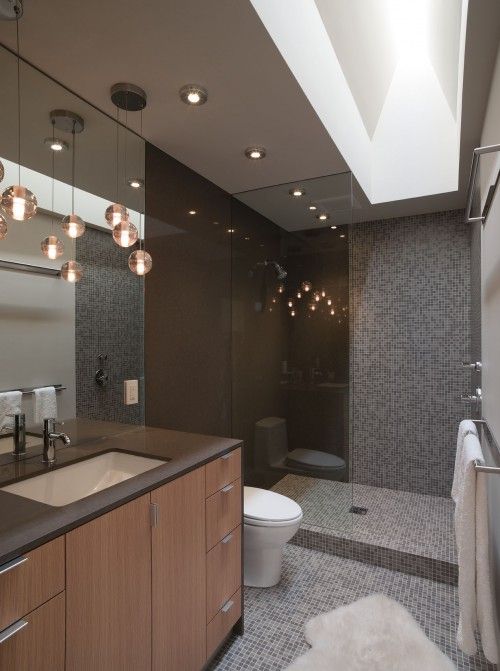 nice layout - shower stall, recessed lighting, light fixture .