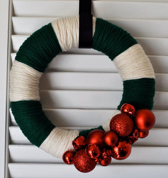 Christmas wreath on Etsy. Love how she used ornaments and jingle .