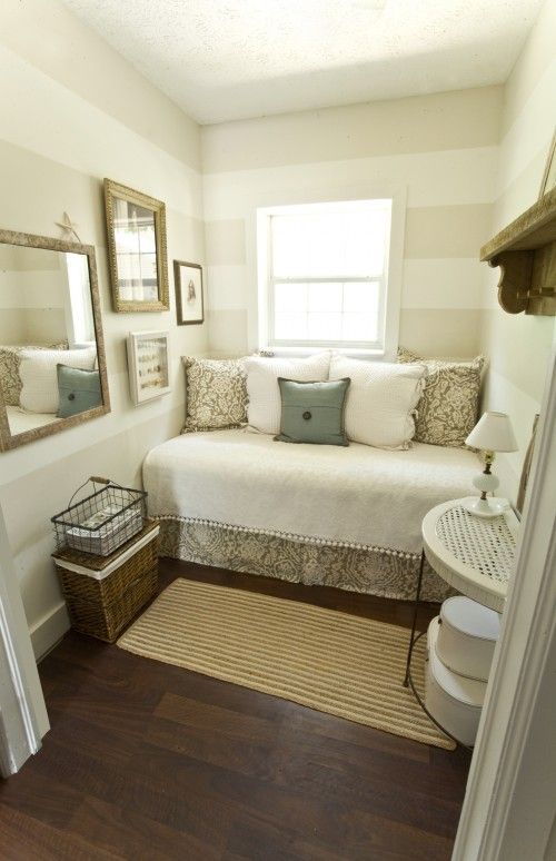 extra bedroom/reading space - great use of space for a tiny room .