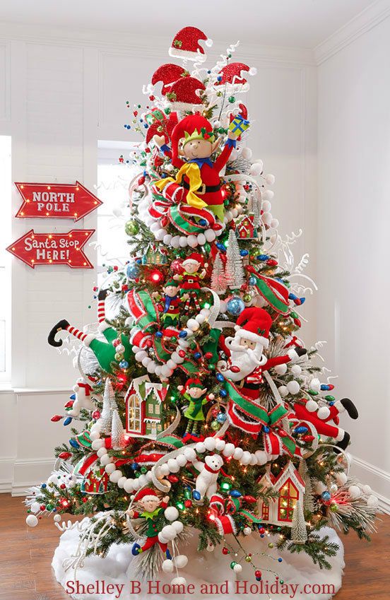 Decorated Christmas tree photo RAZ North Pole Village. Shop for or .
