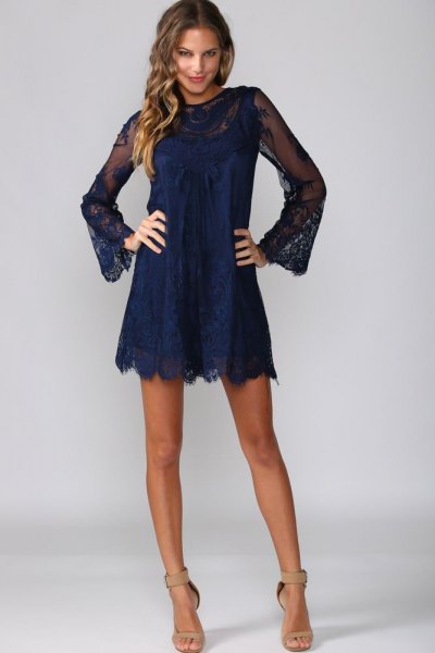Dark blue lace shift dress with bell sleeves and a dark blue hem