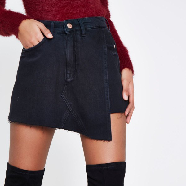 black skort with red fuzzy knit sweater