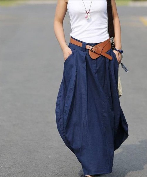 white vest top with dark blue maxi linen skirt
