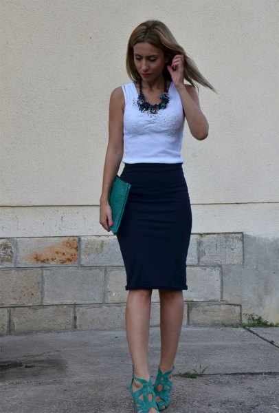 White figure-hugging tank top with pencil skirt