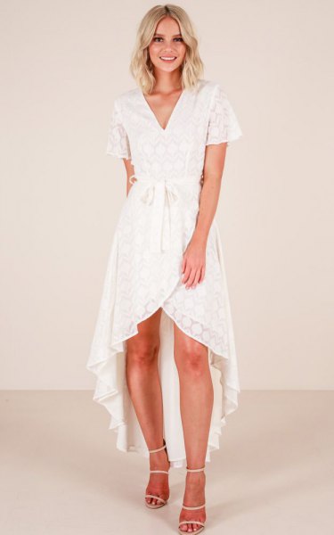 asymmetrical wrap dress made of white lace