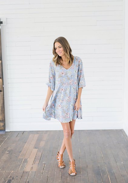 baby blue and white swing dress with floral pattern and half sleeves