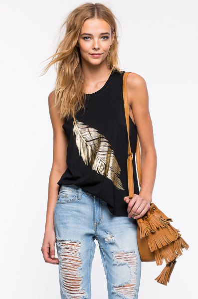 black and gold vest top with torn boyfriend jeans