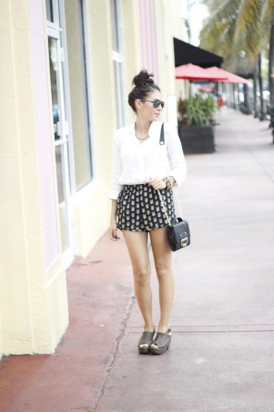 black and pink patterned mini shorts with white shirt with buttons