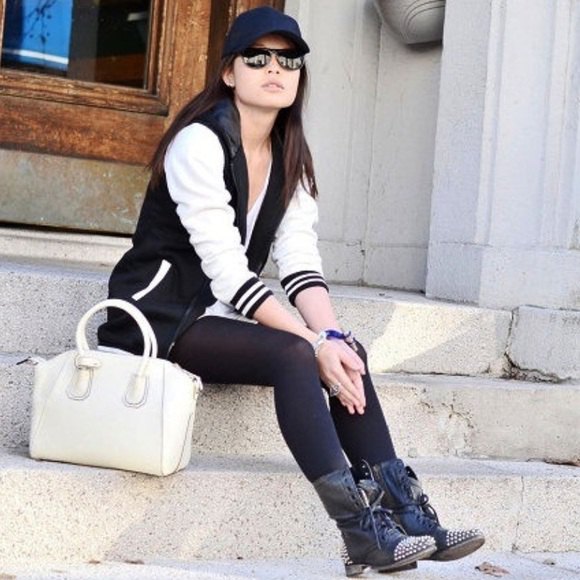 black and white baseball jacket with tunic T-shirt and combat boots with studs