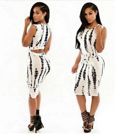 black and white, figure-hugging midi dress with strappy heels