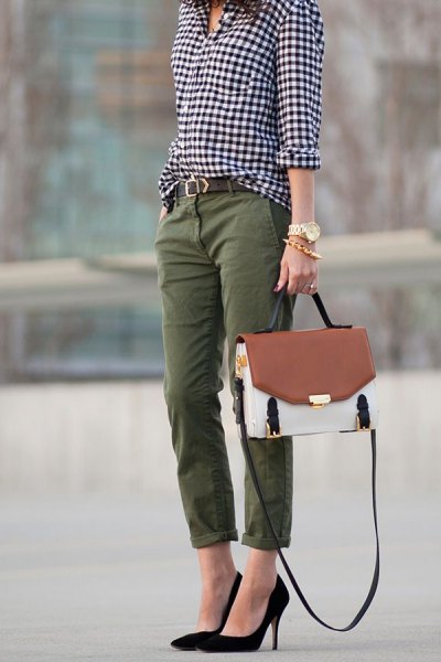 black and white checked shirt with buttons and straight leg trousers with green cuffs