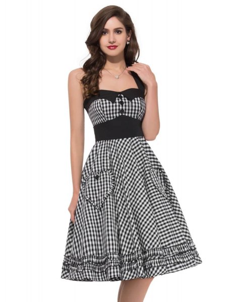 black and white checked fit and flared midi dress with a square neckline