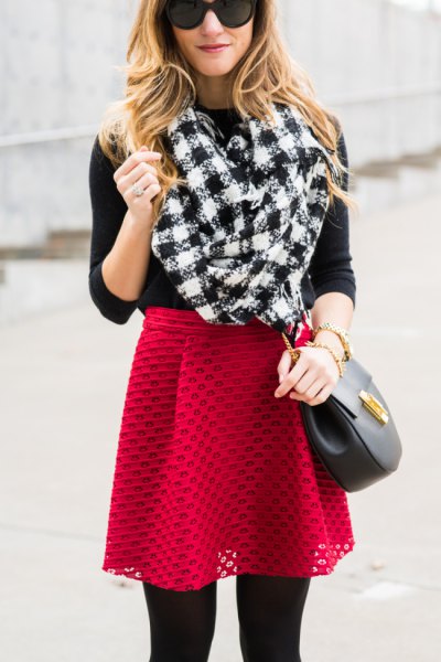black and white checked scarf with a red, semi-transparent skater skirt