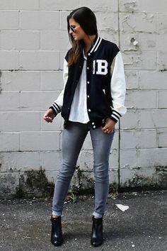 black and white jacket with white T-shirt and gray skinny jeans with cuffs
