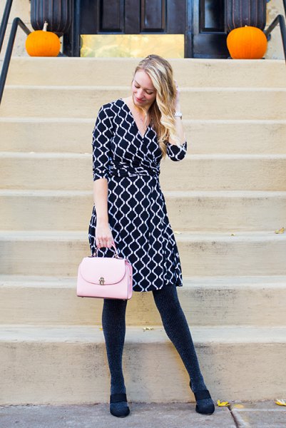 Knee-length wrap dress in black and white