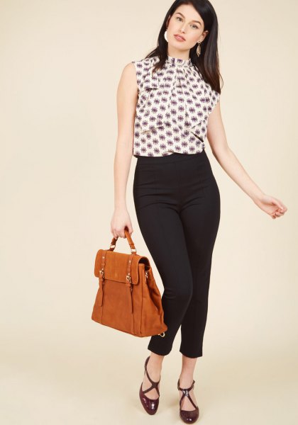 sleeveless blouse with black and white print and ponte trousers