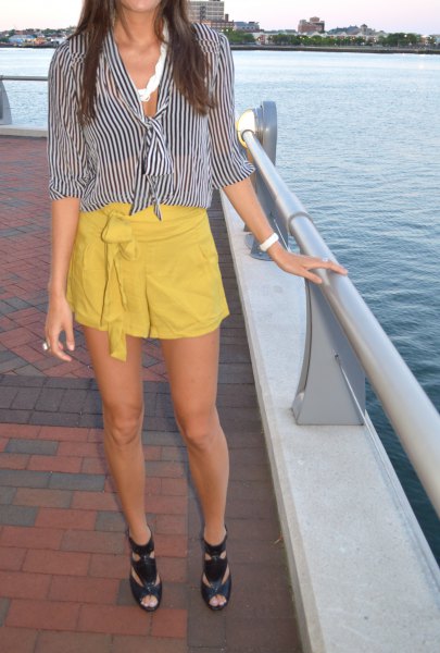 black and white striped blouse with mustard yellow mini skirt