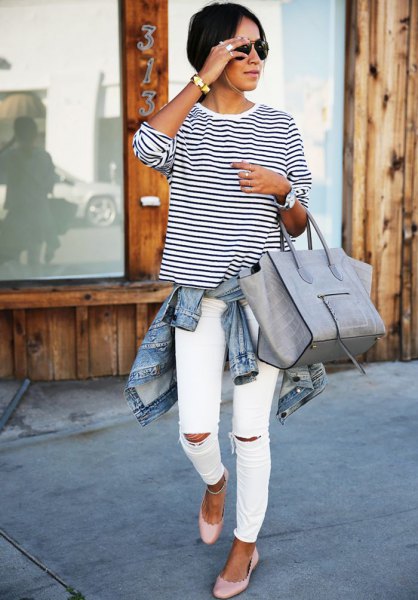 black and white striped long-sleeved t-shirt with round neck and torn slim fit jeans