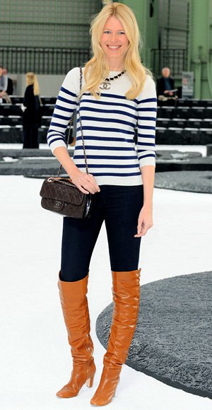 black and white striped knitted sweater with high jeans and orange boots