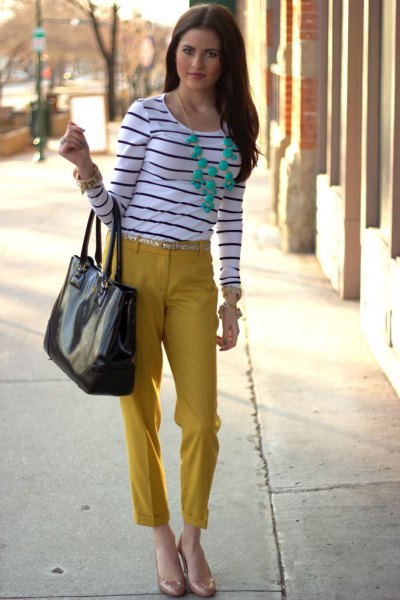 black and white striped long-sleeved T-shirt with mustard-cut trousers