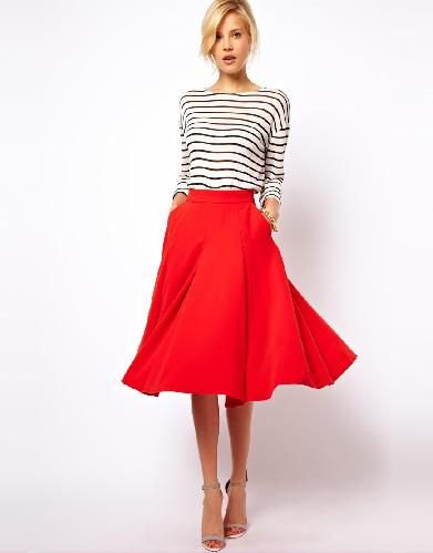 black and white striped long-sleeved T-shirt with red midi skirt