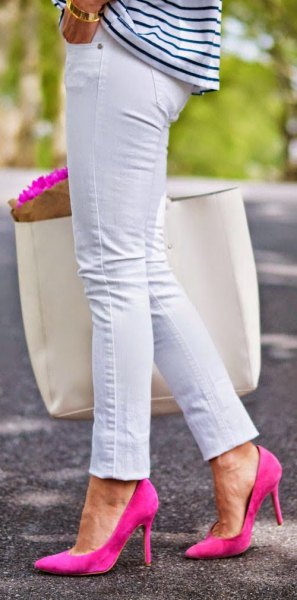 black and white striped long-sleeved T-shirt with slim fit jeans and pink heels