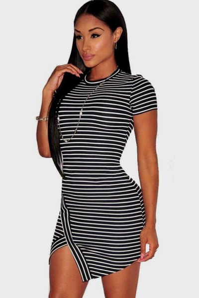 black and white striped, short-sleeved, figure-hugging mini dress