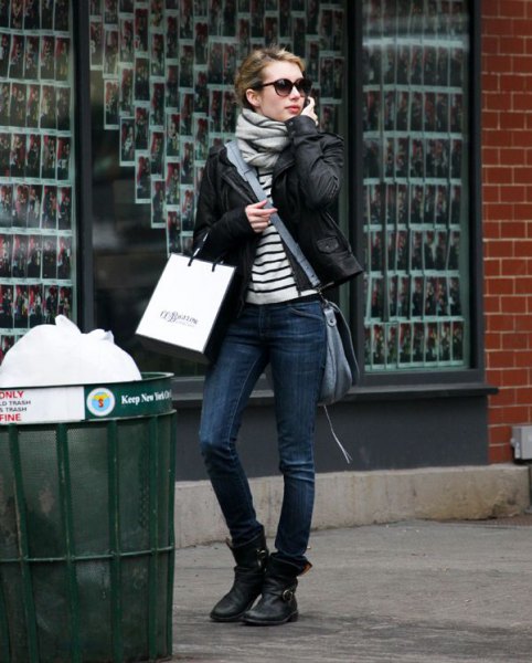 black and white striped t-shirt with biker jacket and leather motorcycle ankle boots