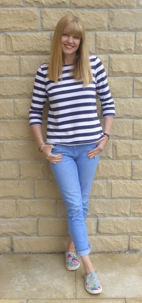 black and white striped t-shirt with light blue jeans with cuffs