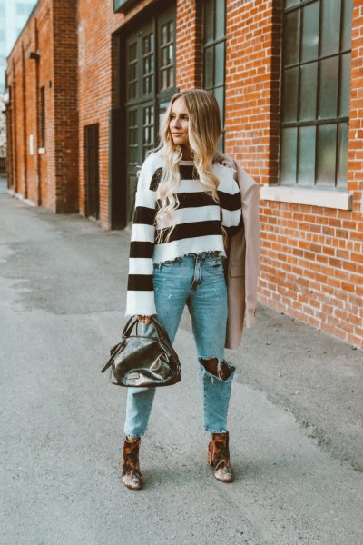 wide striped black and white sweater with ankle boots